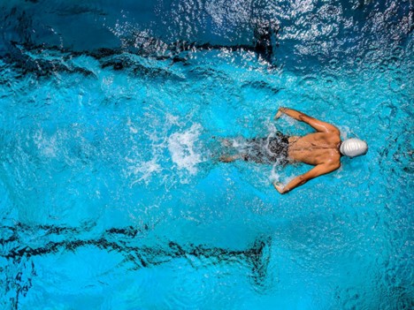 Choosing Your Cardio Champion: Swimming vs. Running